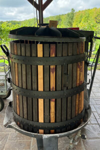 Photo of a wine press a the vineyard.